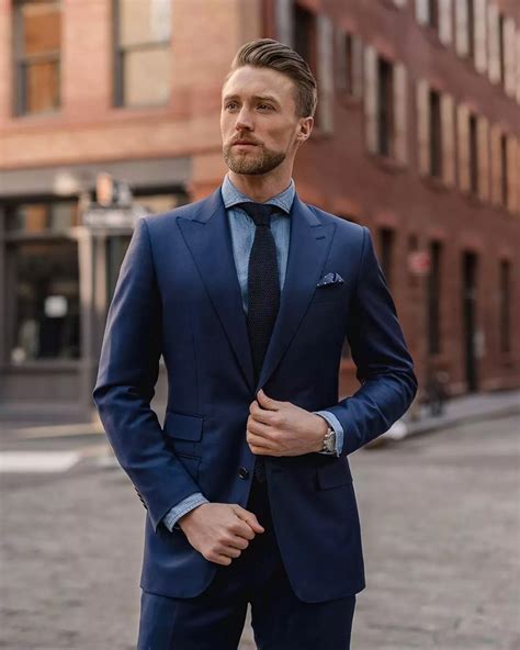 navy suit and navy tie